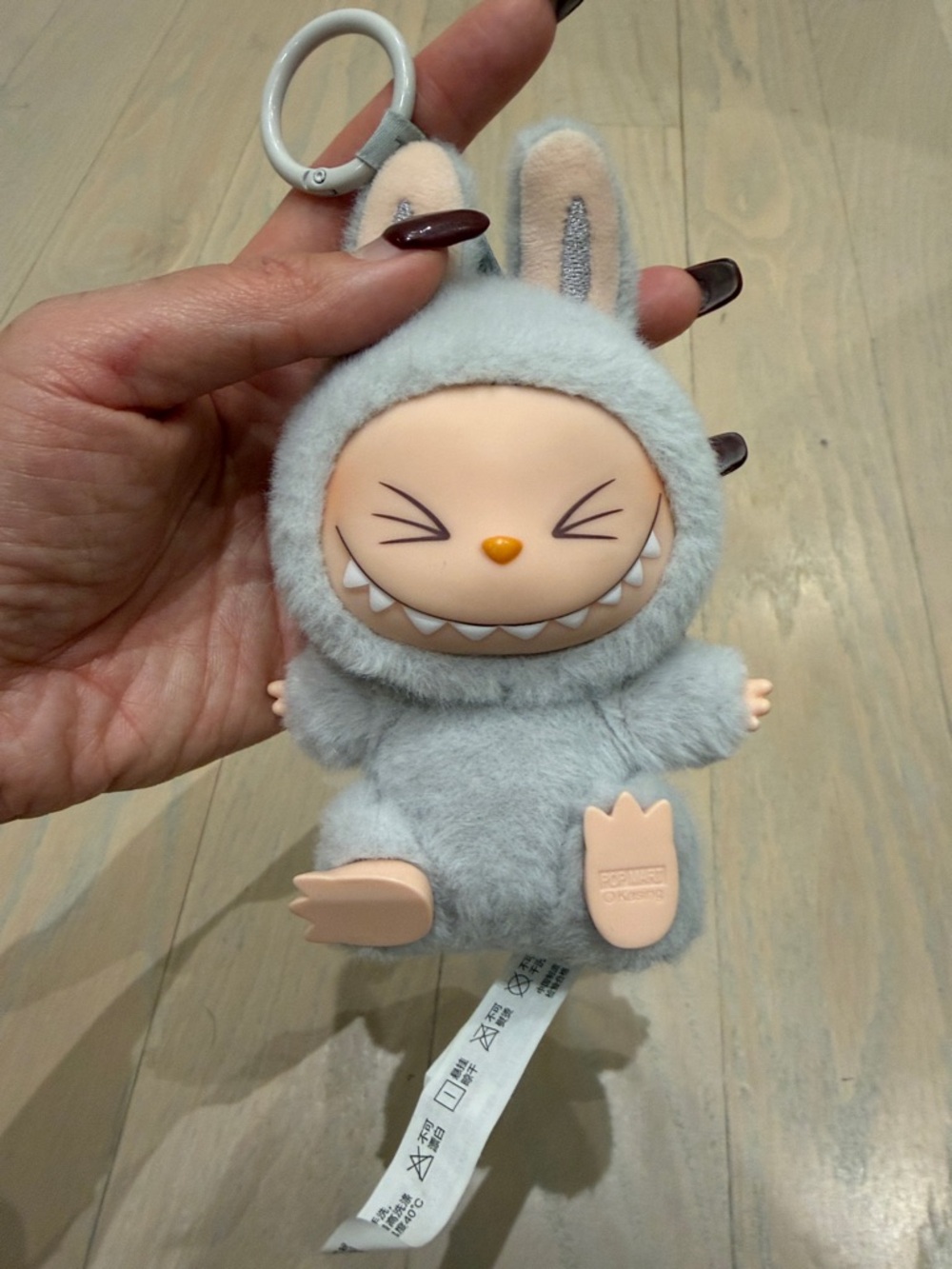 Pop mart Labubu Cute Bunny Plush Keychain in Light Gray with Peach Face